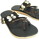 Handmade footwear sandals and slippers for woman. Sea shell sandals slippers Bali
